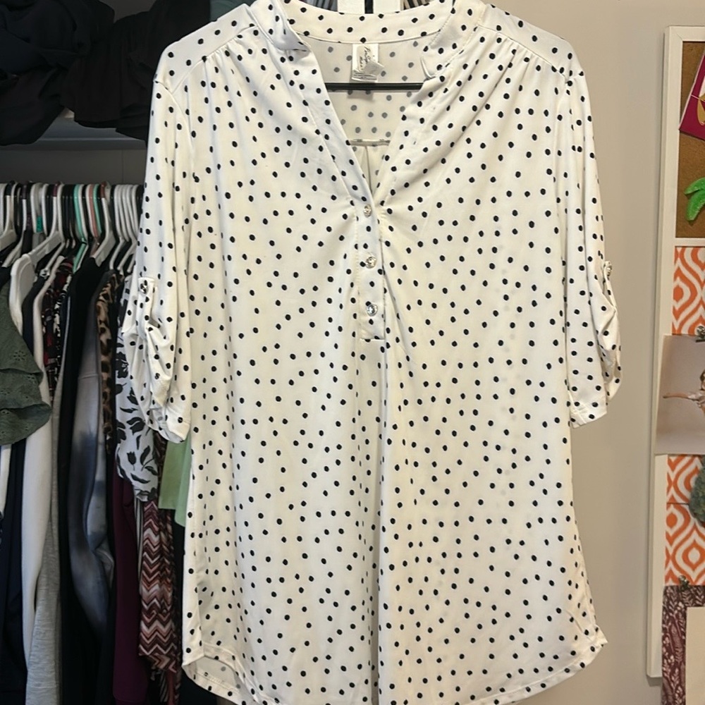 White blouse with black polka dots